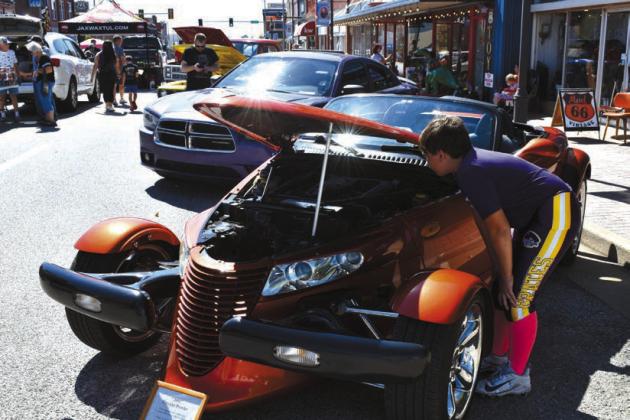 Looks like this boy is getting wowed by the engine of a 2001 Chrysler Prowler. Only 11,702 were built from 1997-2002. courtesy photo