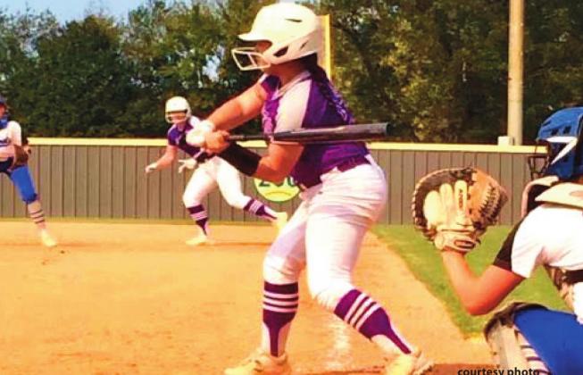 Albaney Pritchard looks to drive a ball as Jaci Shelton gets a lead off of first base. courtesy photo