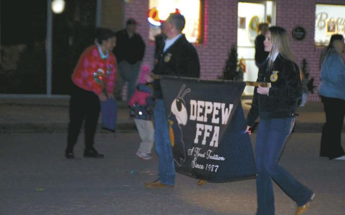 The Town of Depew held its Christmas parade Friday evening. With floats, cars and trucks The crowd enjoyed the show and hot chocolate and chili, along with baked goods offered at the Senior Citizens Center.