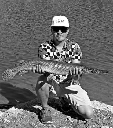 Charlie Conway holds the new state record spotted gar that he caught Oct. 10, 2025, at Lake Texoma. The gar weighed 10 pounds 8.96 ounces. courtesy photo