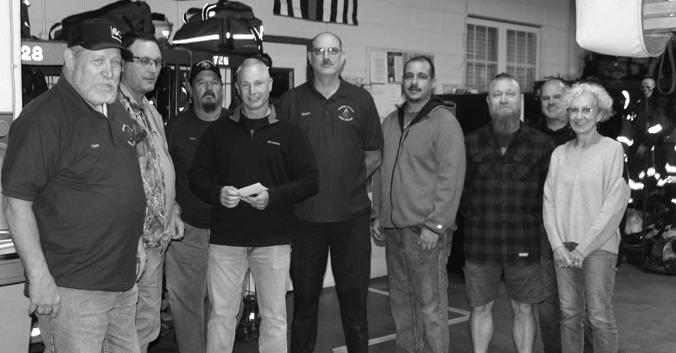 The Masonic Lodge made a donation to the Bristow Fire Department to buy a fire blanket for electric vehicles. The blanket will be used to smother fires on or in electric vehicles. Shown from left is Gene Woods, Billy Shields, Vane Bell, Charles Conkling, Robert Saul, Little Tommy Johnson, Warren VanOrssdol, Brian Peters and Mayor Kris Wyatt. Vicki Grisham photo