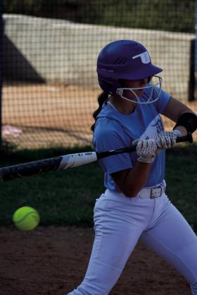 Senior Anne Bailey goes for a hit. courtesy photo