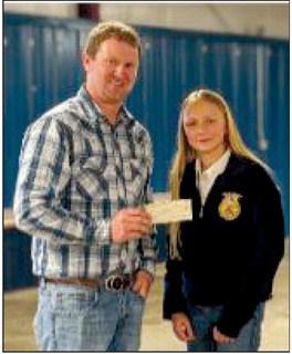 OCCA President Buck Rich presents Grand Champion Clarey Ellis with a $500 award. courtesy photo