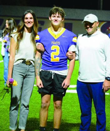 Tyler Lawrence with David Lawrence and Lindsay Jones