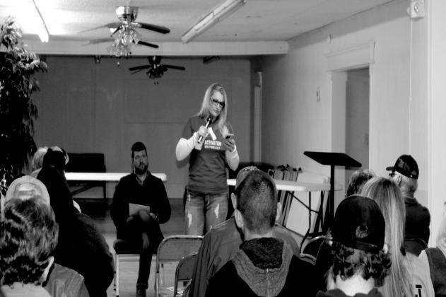 Majel Wisotsky gave an opening statement at the forum, held Saturday evening at the community center. Seated is moderator Michael Willis. Only one mayoral candidate attended the forum, Kris Wyatt. Angie Gentry photo