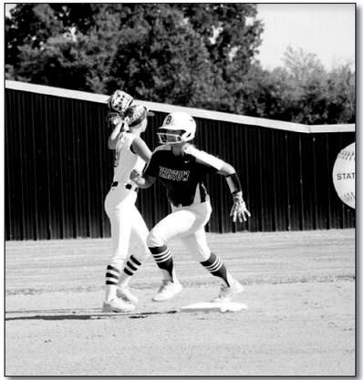 Makenna Ingram rounding second against Inola.