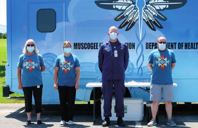 Members of the Muscogee Creek Nation Health Department stood in 90 plus degree heat on Monday, offering the Pfizer vaccine to the Bristow community. From left, Karen Pettigrew, Dallie Lovett, CDR Matt Olson and Chris Gallowich. Stephanie Summers photo