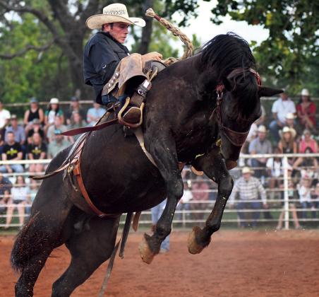 Maverick Parker won the ranch bronc riding with a score of 75 at the Chandler Open Rodeo Friday night. Brian Blansett photo