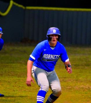 courtesy photo Tyler Burdick leading off third base.