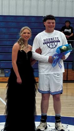 Senior attendant Emily Moore with escort Cale McKenzie. courtesy photo