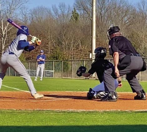 Bruce Macnac frames a strike.
