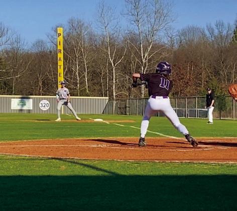 Justin Gilll dropping a bunt.