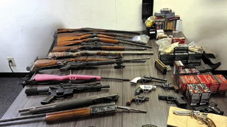 Some of the items seized during the search of Henson’s home. courtesy photo