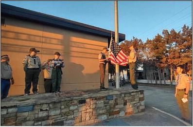 Boy Scout Troop 571 recently performed a color guard ceremony at the Monfort &amp;amp; Allie B Jones Memorial Library and helped the library retire its old flag.