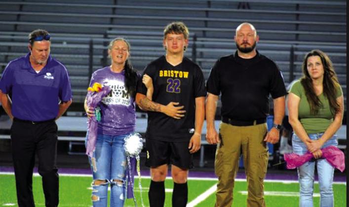 Dylan Cooper with Eric and Callie Montgomery and Brandon and Stephanie Cooper.