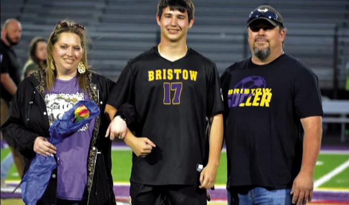 Haven Dennis with Ryan and Brandi Root.