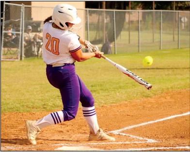 Abby Morgan drives a hit against Mannford.