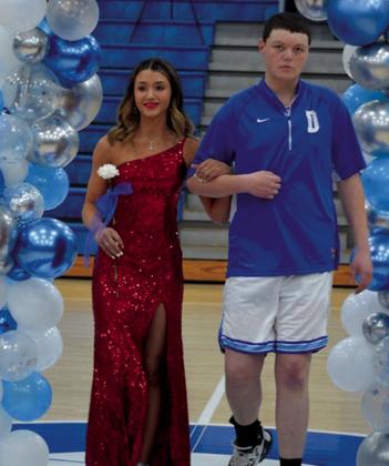 Sophomore attendant Ava Freeze with escort Cale McKenzie.