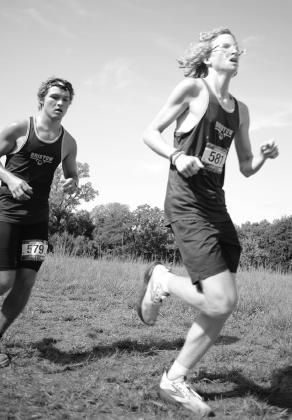 Zach Bentley runs with a time of 11:51.6.