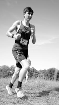 Wyatt Vanzant runs with a time of 13:15.9.