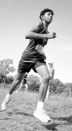 Rio Bruner’s time is 12:17.1. Brian Blansett photos Tri-County Herald
