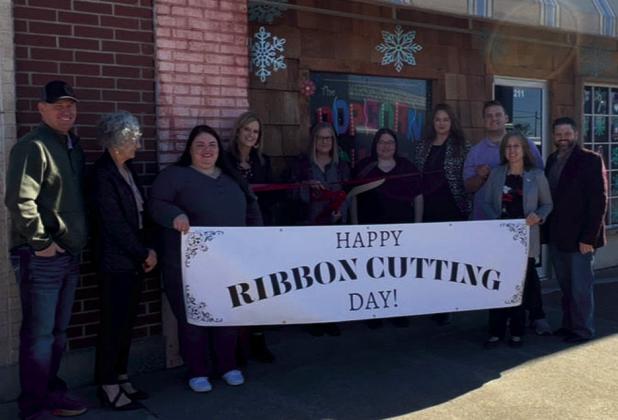 The Popcorn Shack ribbon cutting, from left, Joey Varner, Kris Wyatt, Jeryn Fletcher, Krista Burden, Ronda McBrayer(owner), Danisha Wade (employee), Chelsey Wilson, Chapman Shields, Ashley Powell, and John Tidwell. courtesy photo