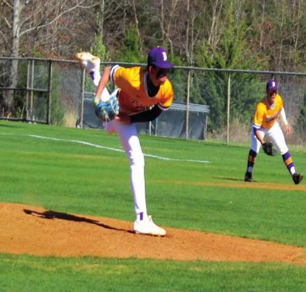 Lane Bledose throws a pitch over home plate while Parker Ledbetter gets ready for the hit. Rebecca Langston photo