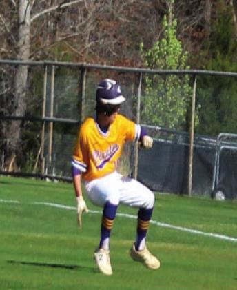 Cade Williams gets caught between first and second base Rebecca Langston photo