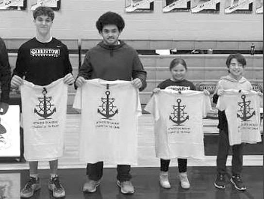 The GoldStandard represents the core values instilled by the Bristow Athletic Dept. The trait for this game was Leadership. Each student will represent this trait.. From left, Will Remington, Bristow High School, Izaiah Shadden, Bristow Middle School, Eleanor Bishop, Edison Elementary and Jackson Wright, Collins Elementary. courtesy photo