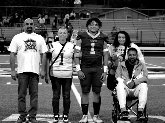 Darien Dansby wih grandparents Buck and Dana Few and parents Greg Dansby and Deidra Jamison.