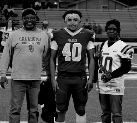 Marcus Johnson with Uncle Fred and Aunt Kathy Johnson.