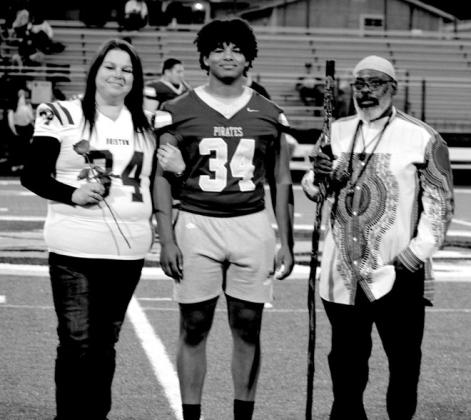 Nation Johnson with parents Eric and Kamryn Johsnson.