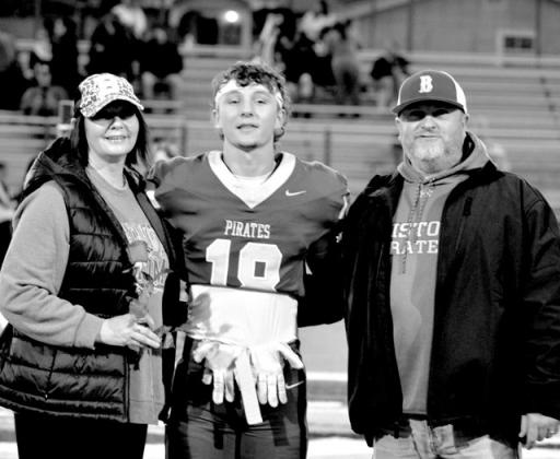 Cade Williams with parents Jason and Angela Williams.