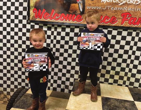 Pictured left, twins Rhett and Rhowen Stewart, age 3. Rhowen shows his second place certificate while Rhett shows his first place. Pictured on far right is older brother Rhyder, age 7, with his fourth place win. courtesy photo