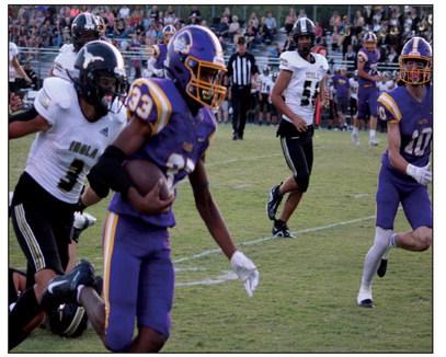 Caleb Alexander runs for the touchdown.
