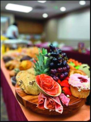 With beautiful chinaware and delicious food the annual Crown’s Tea was a huge success. Partcipating were Kris Wyatt, city council and Carolyn Webb, Bristow Friends of the Library member. courtesy photo