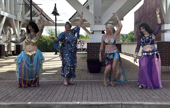 The Tulsa Raqs Belly Dance group entertained a crowd with Shabbi, Dabka', and Saidi Cane Middle Eastern dances.