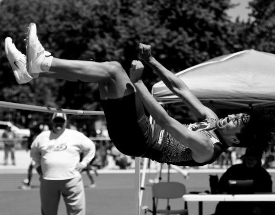Kaden Hooks goes for the high jump.