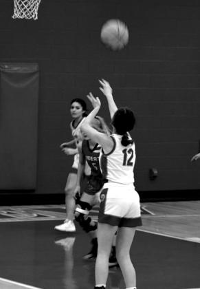 Lauren Carrie shoots for three. courtesy photo