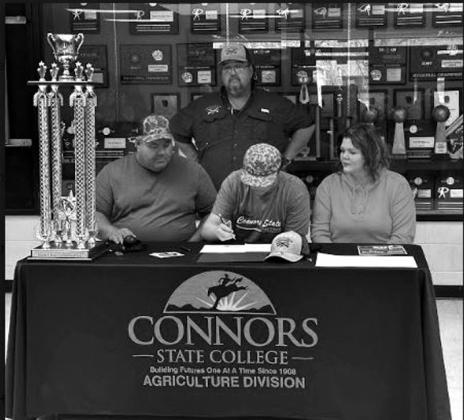 Depew FFA member signs at Conners Shooting Sports Team