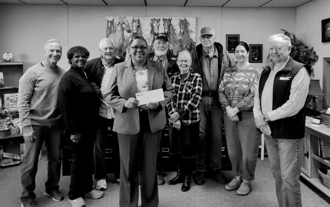 Farm Bureau presents Bristow Social Services a check for $500. Back row from left, :Dwight Luther Farm Bureau board member, Rita Moore social services board member, Bill Hurley social services vice president, Kenny Fisher Farm Bureau vice president, Sharon Vanorsdol social services board member, H.A. Cearley Farm Bureau board member, Anita Osburn Farm Bureau board member, Front row from left, Toni Godwin social services director and Bob Webb Farm Bureau President. Debbie Tribble photo