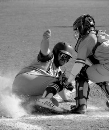 Seth McDaniel slides into home courtesy photo