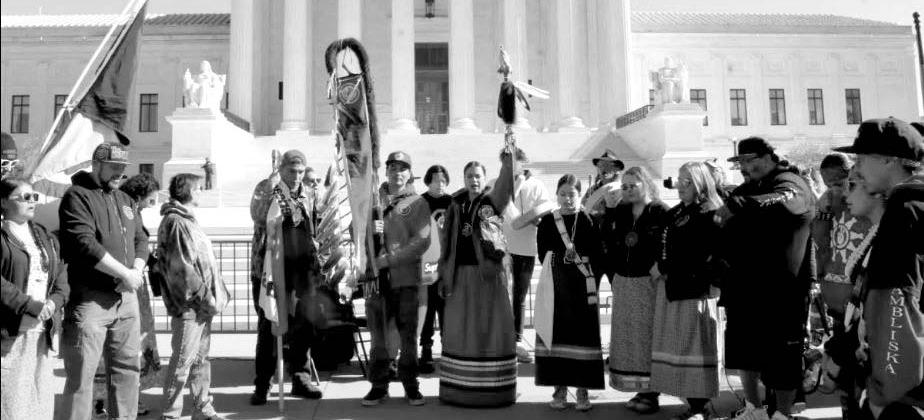 Members of the American Indian Movement rallied on Nov. 9, 2022 on the steps of the U.S. Supreme Court in Washington, D.C. during oral arguments for Brackeen v. Haaland