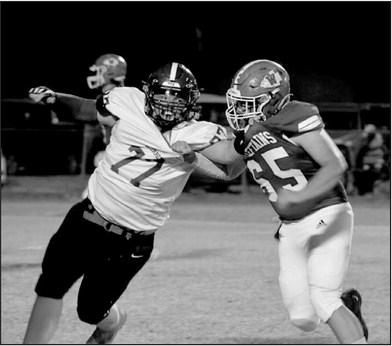 Christopher White runs the play. courtesy photo
