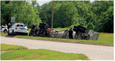 Angie Gentry photo The truck shown here swerved to miss a car that pulled out in front of him on South Highway 48.