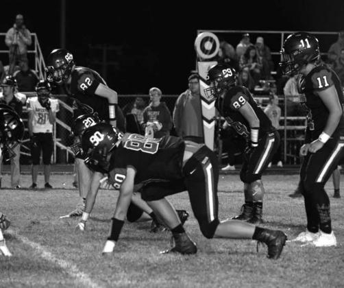 The Hornets prepare to run the play.