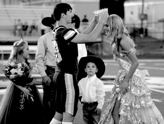 Seniors King Chandler Fortney and Queen AvaYocham with Pirate Princess Belle Groom and Crown Bearer Cable Cole.