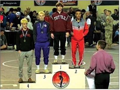 Pirate wrestler Javon Freeman also takes a third place spot on the podium for the 125 lb weight class. courtesy photorr