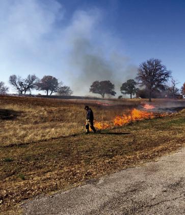 courtesy photo Mrs. Lundy's FFA class observed the Bristow Fire Dept. conduct a controlled burn of the Rotary Club Wildflower Field at the city park last Monday. This is part of an ongoing project to develop Oklahoma native flowers and grasses for the annual Wildflower Run.