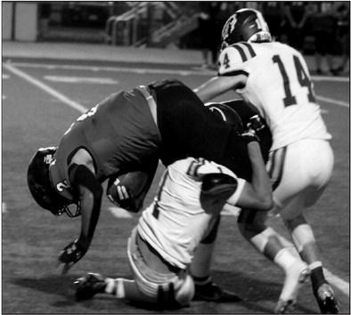 Rebecca Langston photo Darien Dansby and Cade Williams for the take down.